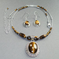 Sterling Silver 16-20" Yellow Tigerseye Oval Center $64